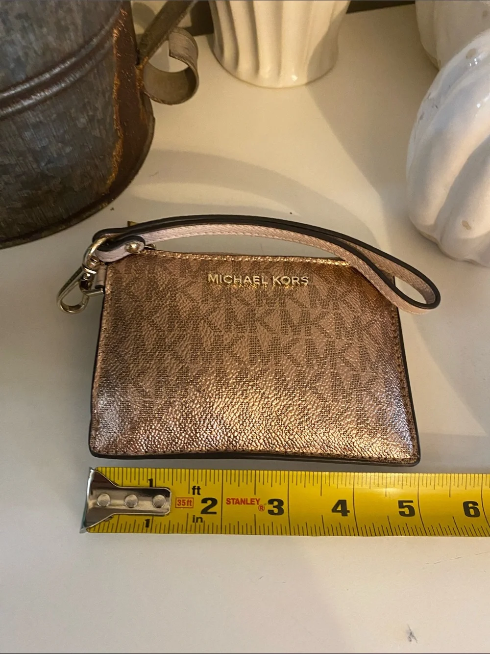 Michael Kors Metallic Rose Gold and Blush Wristlet w/ gold Hardware
